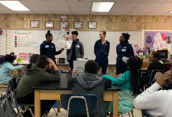 Women's Basketball Participates in Reading Day