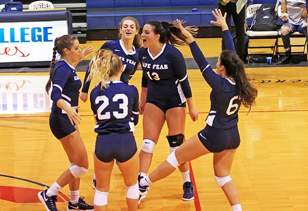 Volleyball Holds on for Victory